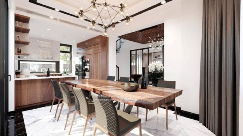 Sẽ là một gợi ý độc đáo với sự có mặt tủ bếp gỗ óc chó veneer nâu trầm kết hợp tone màu trắng sáng, long lanh từ tủ bếp trên gỗ An Cường acrylic và mặt bàn bếp đá nhân tạo LG. Sự tương phản giữa 2 sắc màu sẽ là ý tưởng tuyệt vời cho bố trí nội thất phòng bếp hiện đại cho không gian nhà phố, biệt thự.